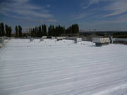 K-5 Contractings completed urethane foam and elastomeirc roofing system.