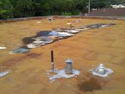 Deteriorated roof with ponding water.